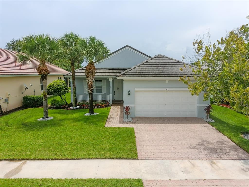 Photo of 149 NW Willow Grove Avenue, Port Saint Lucie, FL 34986 (MLS # R10751021)