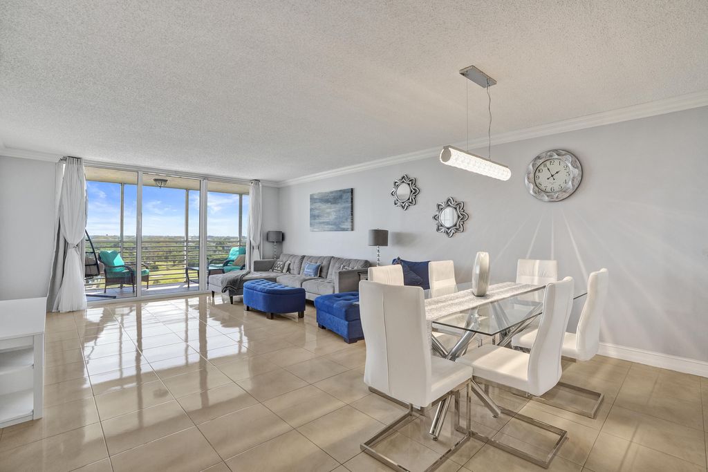 Photo of 3520 Oaks Way #1010, Pompano Beach, FL 33069 (MLS # B26007243)