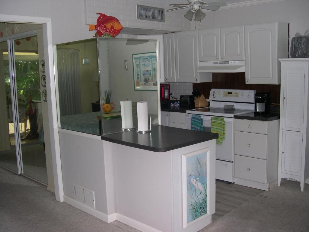 Photo of 1200 Colonnades Drive #201, Fort Pierce, FL 34949 (MLS # R11069901)