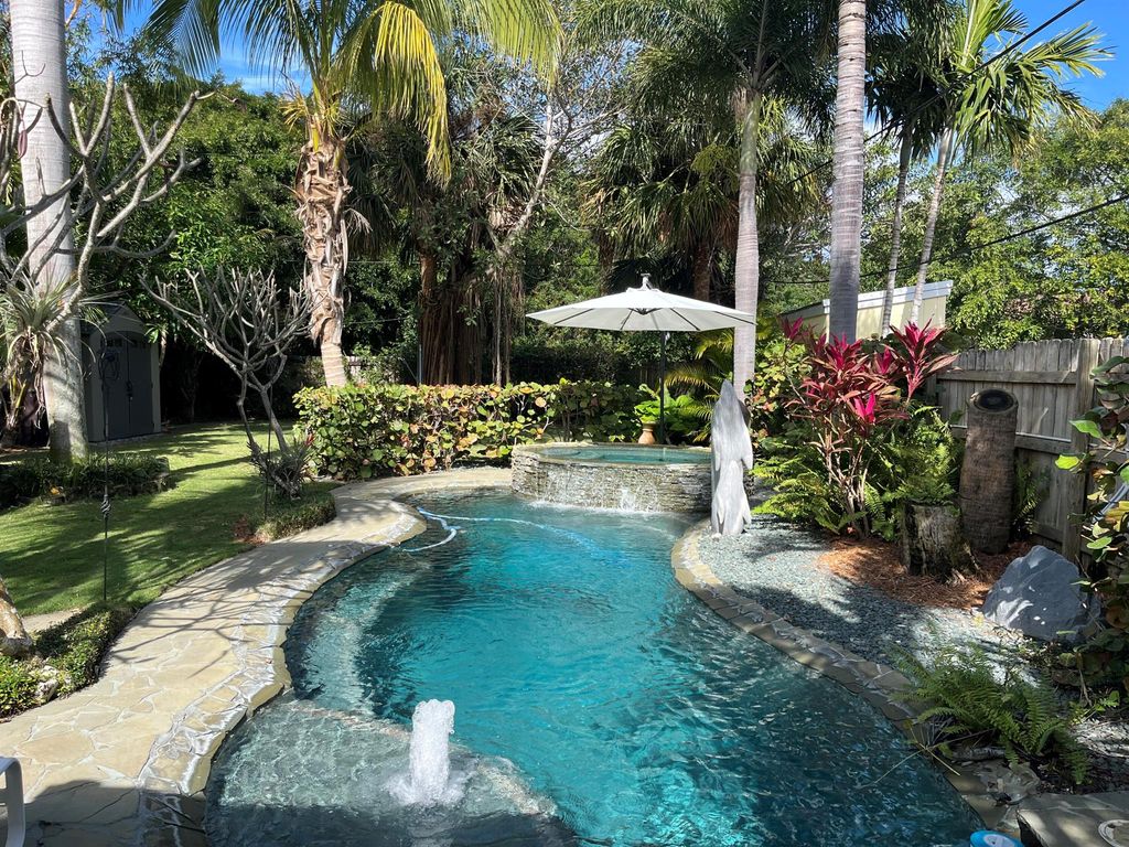 Photo of 129 Foresteria Drive, Lake Park, FL 33403 (MLS # R11056463)