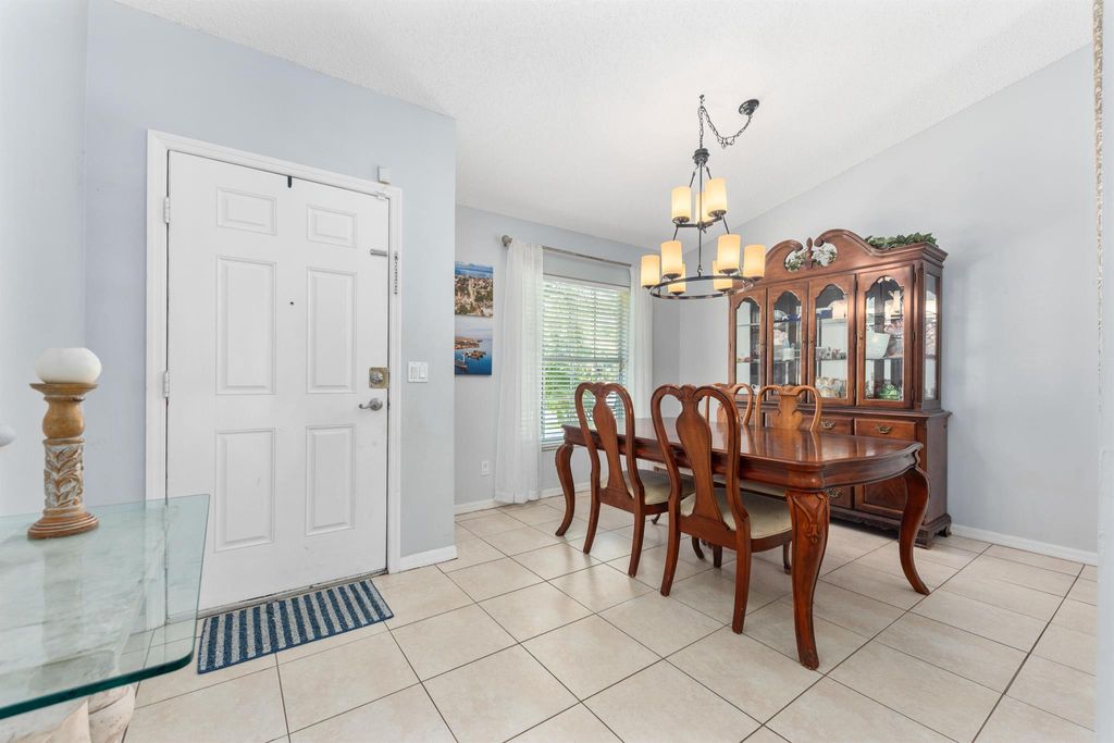 Photo of 1417 SW Flounder Lane, Port Saint Lucie, FL 34953 (MLS # R11008695)