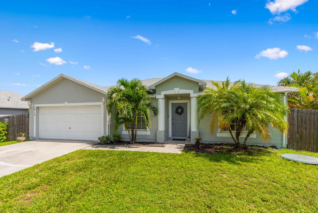 Photo of 1417 SW Flounder Lane, Port Saint Lucie, FL 34953 (MLS # R11008695)