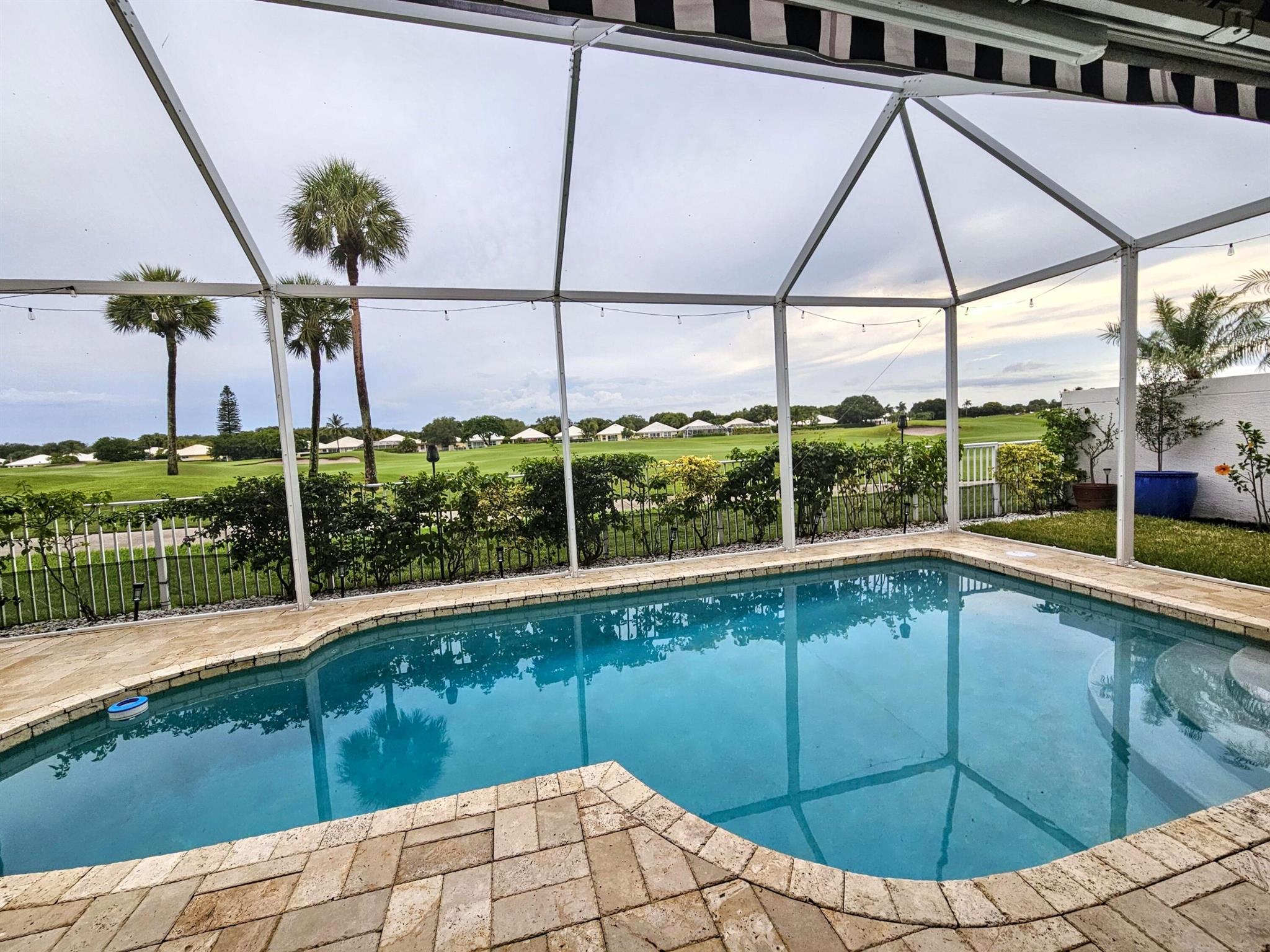 This elegant, fully furnished, move-in ready 4-bedroom, 2.5-bath home is located directly on the prestigious Bear Lakes Golf Course in the private, gated community of Avondale. With tranquil golf course views, a spacious layout, and quality finishes throughout, this home offers the perfect blend of comfort, convenience, and South Florida lifestyle.The home comes fully furnished--including luxury linens, dishes, kitchenware, towels, TVs, and more--making it truly turnkey and stress-free for any renter. Everything you need is already here, down to the wine glasses and beach towels. Just bring your suitcase!