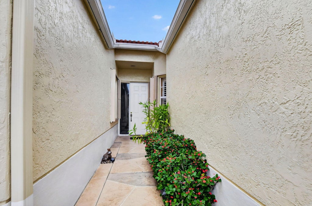 Photo of 15221 Ixora Road, Delray Beach, FL 33484 (MLS # B26093259)