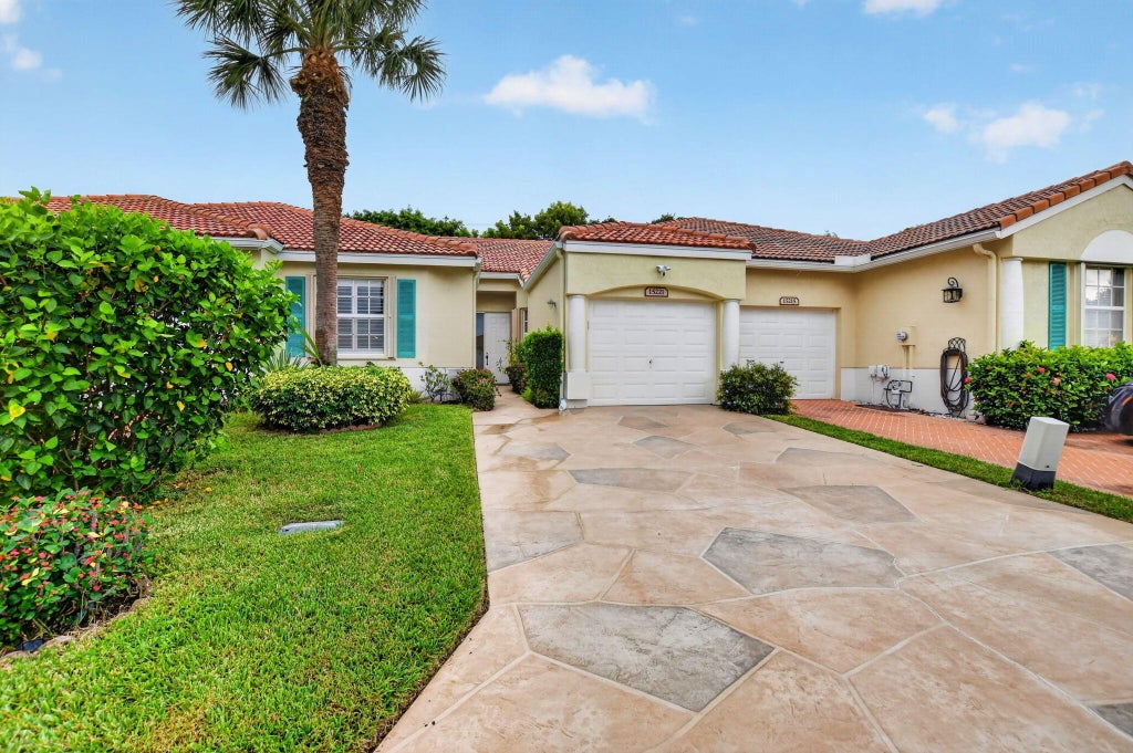 Photo of 15221 Ixora Road, Delray Beach, FL 33484 (MLS # B26093259)