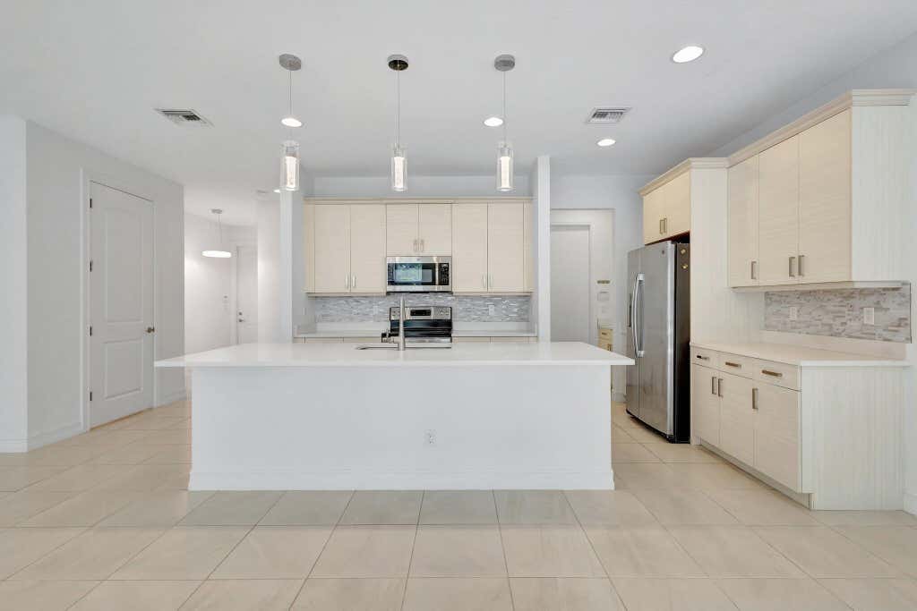 Photo of 91 PALM Lane, Royal Palm Beach, FL 33411 (MLS # B26059289)