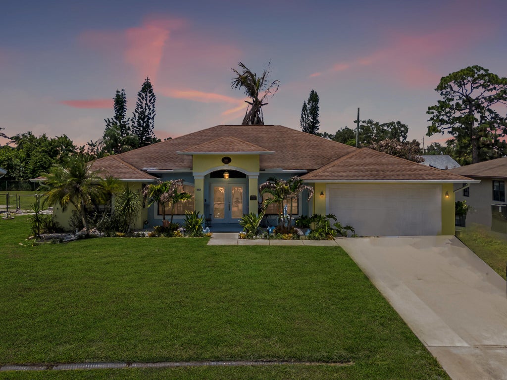Photo of 591 SE Chapman Avenue, Port Saint Lucie, FL 34984 (MLS # B26041364)