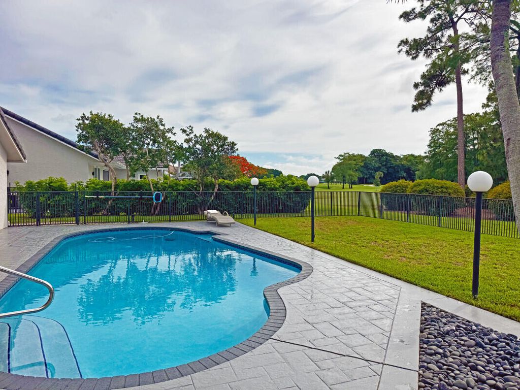 Photo of 10875 Boca Woods Lane, Boca Raton, FL 33428 (MLS # B26037163)