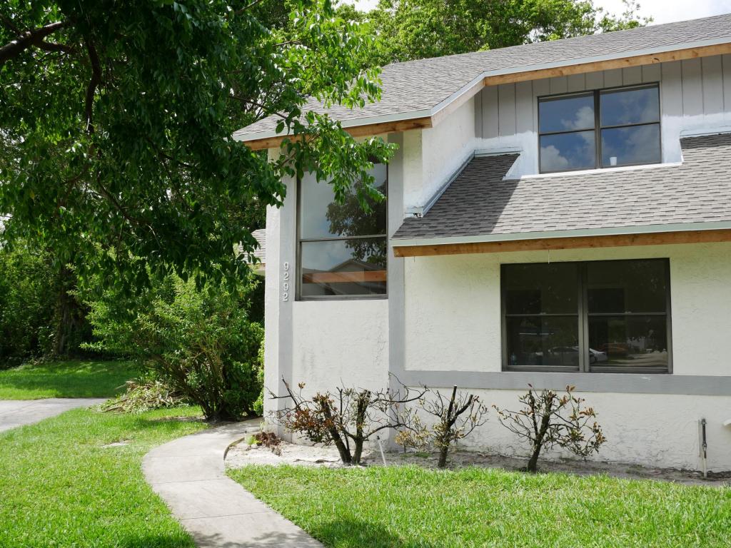Everything New! High-quality renovation - Over 50k! 3 bedrooms corner unit townhouse. All new kitchen, bathrooms, kitchen appliances, wood floors, A/C, water heater. Bright and open floor plan. Kitchen with real wood white custom cabinets, granite counters, porcelain backsplash, stainless steel appliances. Porcelain tile that looks like marble in all living areas, all bathrooms, master bedroom. NO POPCORN, NO CARPET! New faucets, sinks, toilets, baseboards, fans, lights, blinds, interior paint. MOVE IN READY! Assessment paid by owner. Boca Ridge Park is pet-friendly, all ages, manned gated community in West Boca Raton. Can rent immediately, min 3 months. 2 assigned parking spaces. Community has new roofs. Buildings are being painted now.