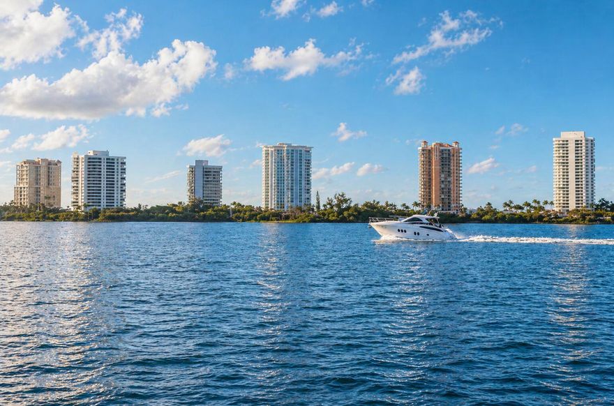 Experience true waterfront living on the Intracoastal! This rare 2BR/2BA ground-floor condo is one of only seven walkout units, featuring a private outdoor patio overlooking the water and a lush grass lawn just steps away. Enjoy breathtaking sunrises over Singer Island as boats and jet skis glide by, with frequent sightings of manatees, turtles, and stingrays. Beautifully furnished in a fresh coastal style, this home offers stainless steel appliances, tile floors, stackable washer/dryer, auto blinds, and a walk-in tub in the guest bath. King bed in the primary, queen in the guest, plus generous closet space. Community pool, walk to Lake Park Marina, and just 5 minutes to beaches, dining, shopping, snorkeling, and Peanut Island. South Florida living at its best!