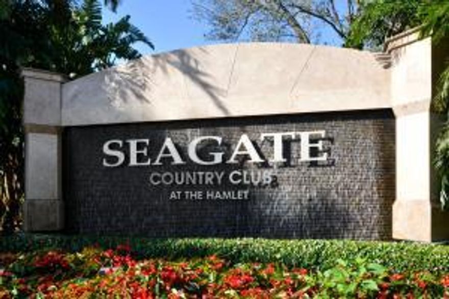 Welcoming and inviting spacious 2 bedroom, 2 bath, 1st floor, garden condo nestled in beautiful Seagate Country Club Community. Updated, EIK with granite and SS appliances.  Lanai  converted to sunroom/office, laundry, walk-in closets, impact windows throughout. Delightful private patio for entertaining, Carport, storage, community heated pool.  Serenity and tranquility abound.  Live the country club life style with no mandatory fees, 24/7 gate-manned access, close to shopping, highways, restaurants and 2.5 -3 miles to downtown Delray and beaches - Location, location!