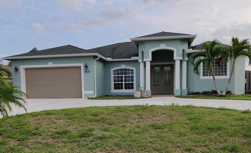 Photo of 510 SW Nagle Place Pl, Port St Lucie, FL 34953 (MLS # R10819381)