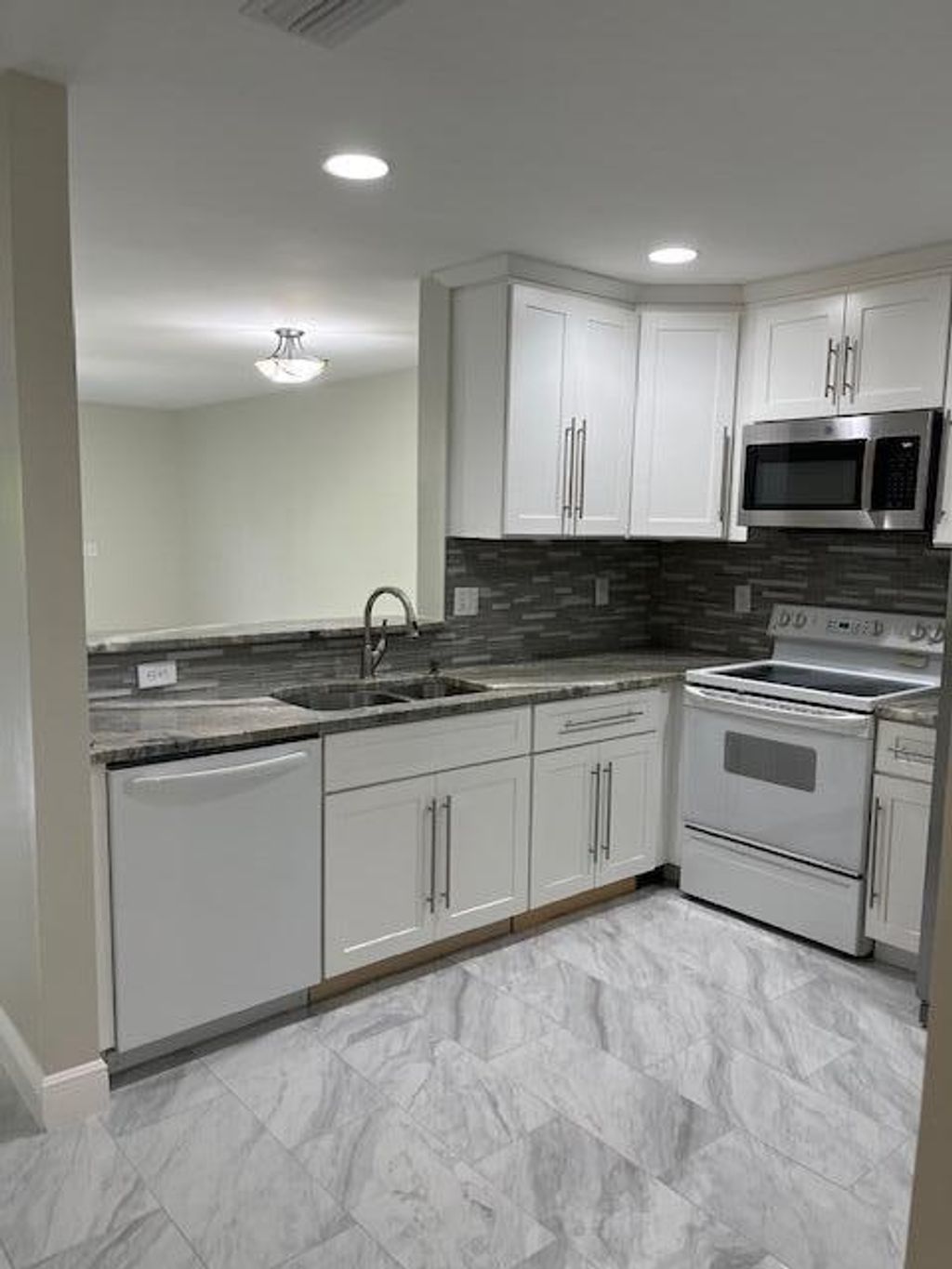 Photo of 9826 Kamena Circle, Boynton Beach, FL 33436 (MLS # R11091588)
