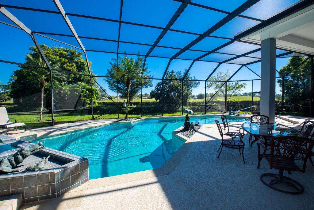 Photo of 623 SW Palmetto Cove, Port Saint Lucie, FL 34986 (MLS # R10962471)