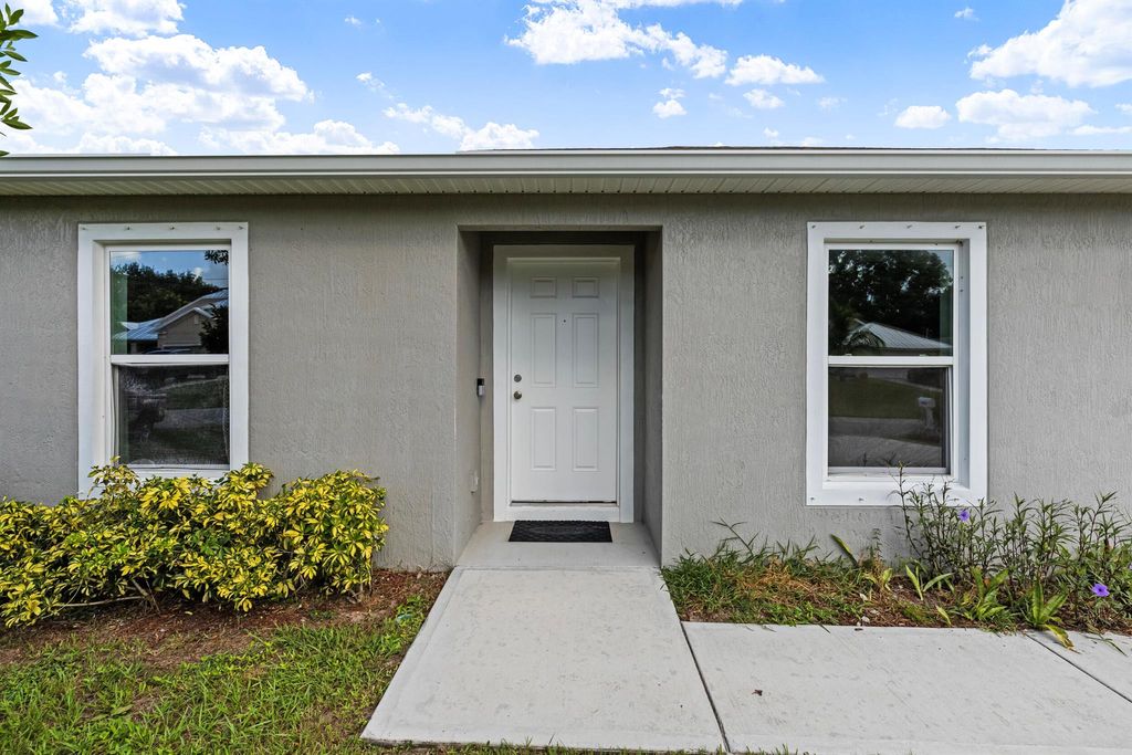 Photo of 1966 SW Lennox Street, Port Saint Lucie, FL 34953 (MLS # R11016021)