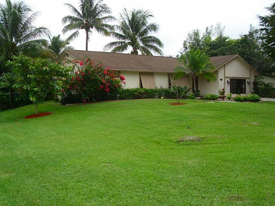 COUNTRY ESTATES FINEST! TRUE PRIDE OF OWNERSHIP!W-FANTASTIC CURB APPEAL*PERFECT FOR LARGE FAMILY SPLIT FLOOR PLAN 2 MASTER SUITES W-FULL BATHS* 1500 SQ FT DETACHED 3 CAR GARAGE-30x50-W 16' CEILINGS*WORK FROM HOME*OFFICE,GYM,GAME RM-3RD BAY HAS ELECTRIC &    WATER -LIMEROCK DRIVEWAY LEADS TO SECLUDED BACK YARD CARIBBEAN FRUIT TREES ABOVE GROUND POOL W WOOD DECK LARGE SCREENED PATIO *NEW:5 TON A/C,SS APPLIANCES, WASHER,DRYER, PORCELAIN TILE IN LIVING AREAS& 2ND MASTER BR*NO HOA*BRING YOUR HORSES*MOV