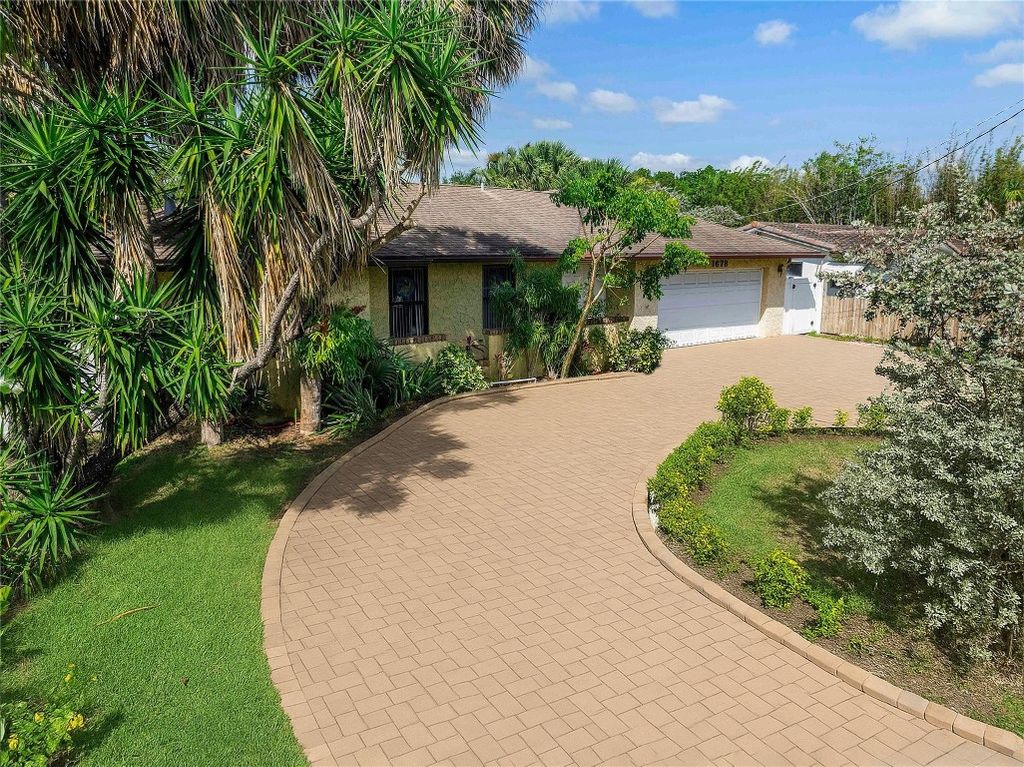 Photo of 1678 NW 36th Court, Oakland Park, FL 33309 (MLS # F10541323)