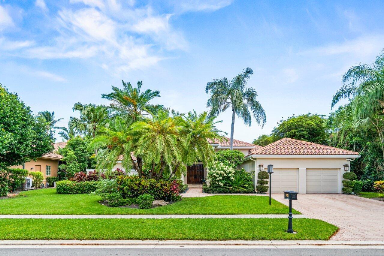 Stunning dream home in prestigious Boca Grove Golf & Tennis Club. This home sits on a .33 acre lush lot and offers light-filled living space with soaring ceilings and luxurious finishes throughout. High end kitchen appliances, quartz countertops, gas Thermador stove, oven, warming drawer, wine cooler. Open den area with built ins and gas fireplace. Oversized primary suite overlooks the serene, landscaped backyard and sparkling pool. Enjoy spa-inspired bathrooms and peace of mind with 2020 roof. Step outside to your private oasis with outdoor dining, lounge areas, and spacious screened in lanai. You'll enjoy world-class 18 hole golf course designed by Jim Fazio, tennis center, pickleball, padel, state of art fitness center, dining, clubhouse, card rooms.Short walk to house of worship