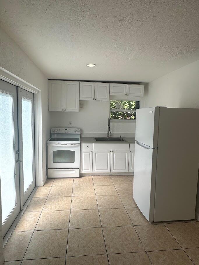 Photo of 4027 Pot O Gold Street #Unit 2, West Palm Beach, FL 33406 (MLS # B26092348)