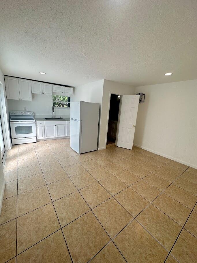 Photo of 4027 Pot O Gold Street #Unit 2, West Palm Beach, FL 33406 (MLS # B26092348)