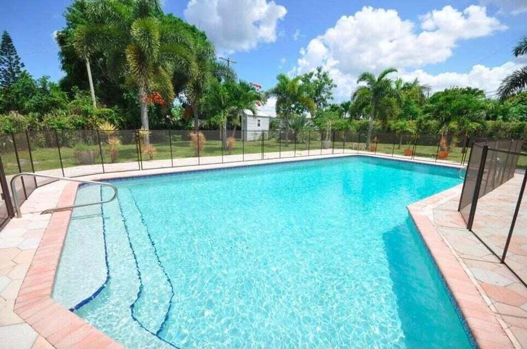 Photo of 272 NW 45th Street, Boca Raton, FL 33431 (MLS # R11085573)