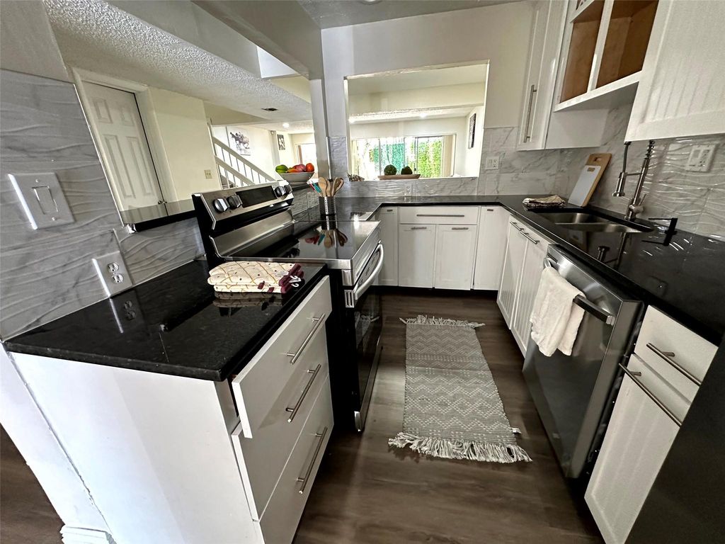 Photo of 1771 NW 58th Avenue #12, Lauderhill, FL 33313 (MLS # F10434621)