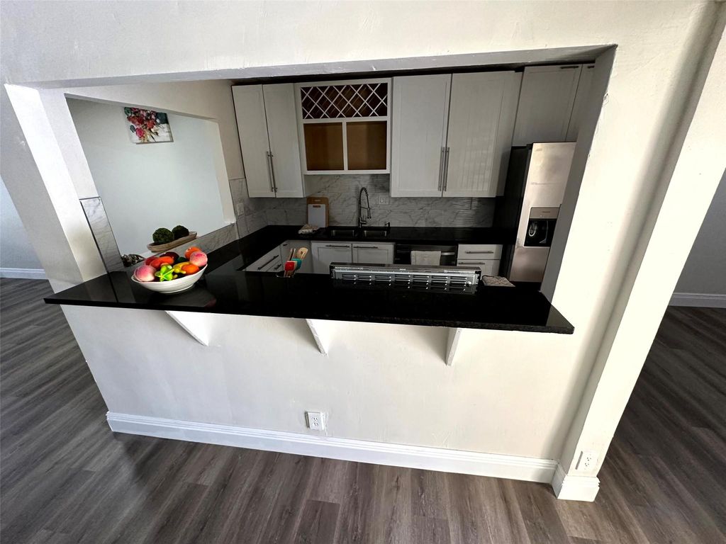 Photo of 1771 NW 58th Avenue #12, Lauderhill, FL 33313 (MLS # F10434621)
