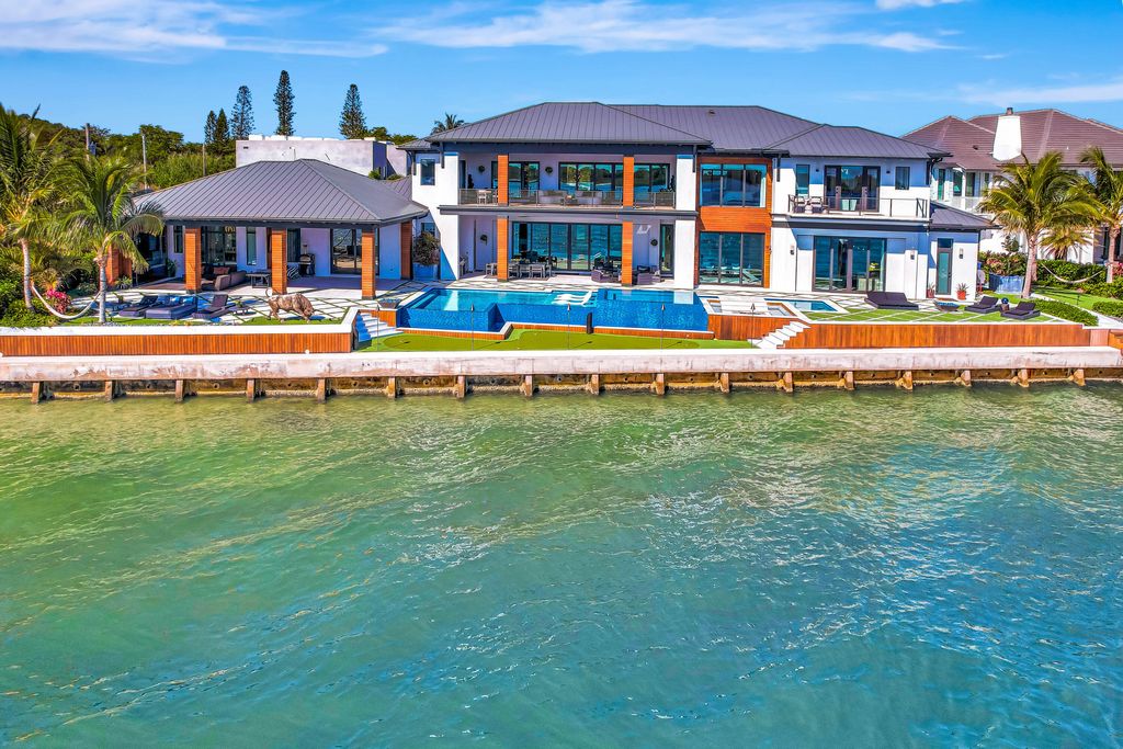 Photo of 712 Lakeside Circle, North Palm Beach, FL 33408 (MLS # R11161437)