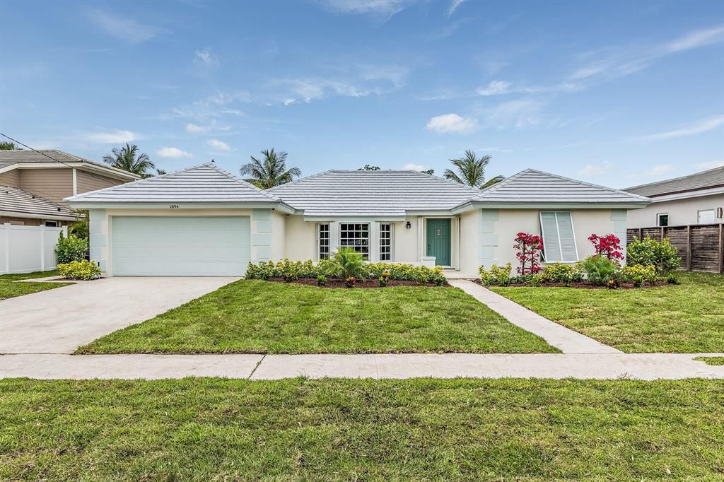 Photo of 1894 Tudor Road, Juno Beach, FL 33408 (MLS # R10725674)