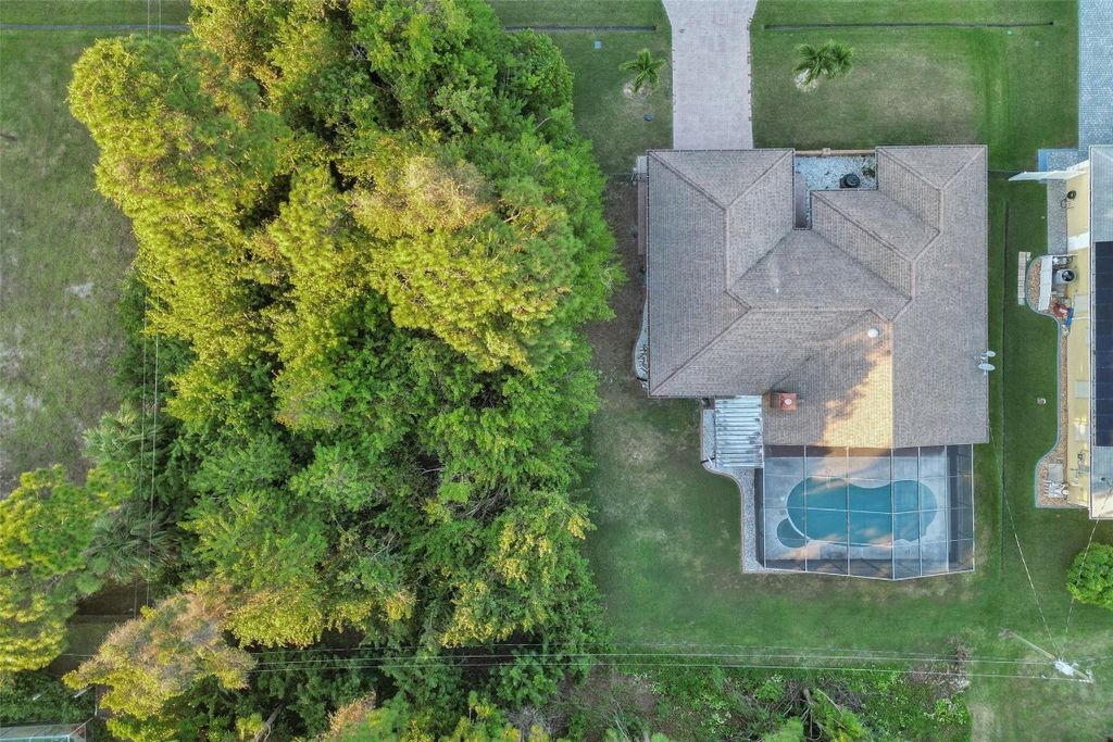 Photo of 750 SE Cavern Avenue, Port Saint Lucie, FL 34983 (MLS # F10538322)