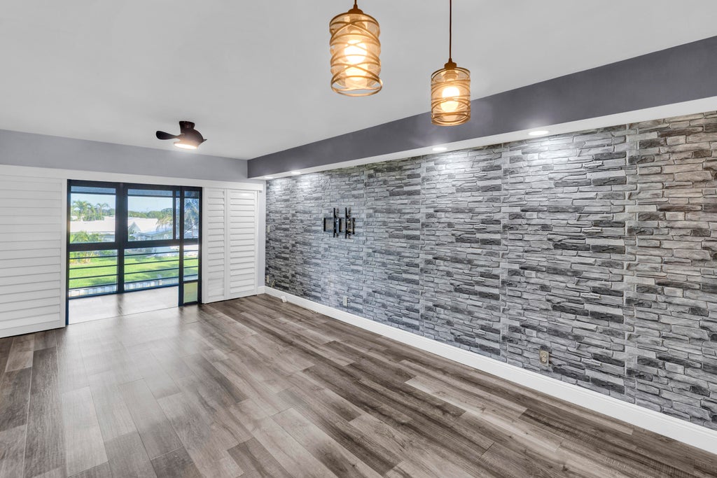 Photo of 1901 W Woolbright Road #A203, Boynton Beach, FL 33426 (MLS # R11151672)