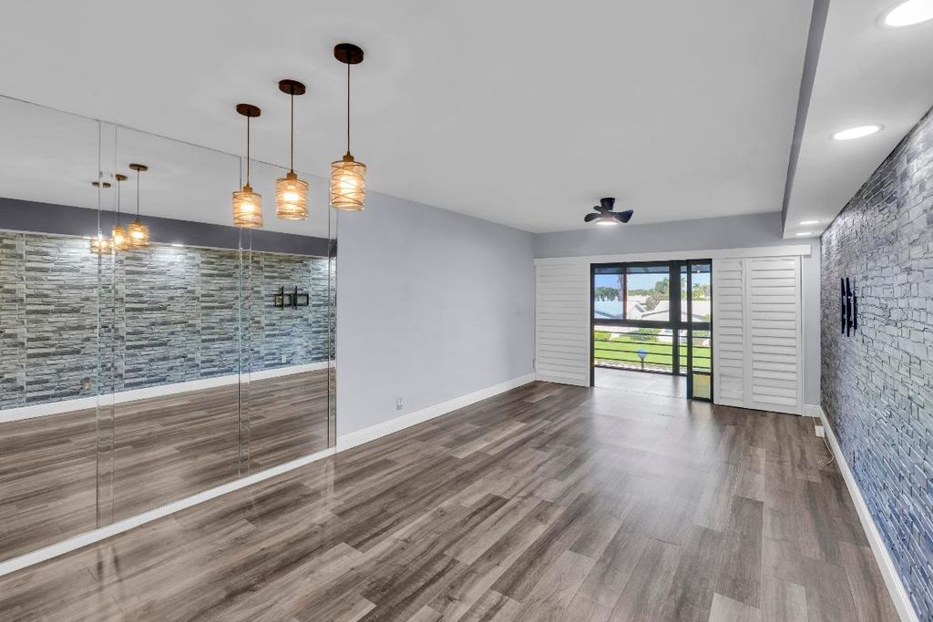 Photo of 1901 W Woolbright Road #A203, Boynton Beach, FL 33426 (MLS # R11151672)