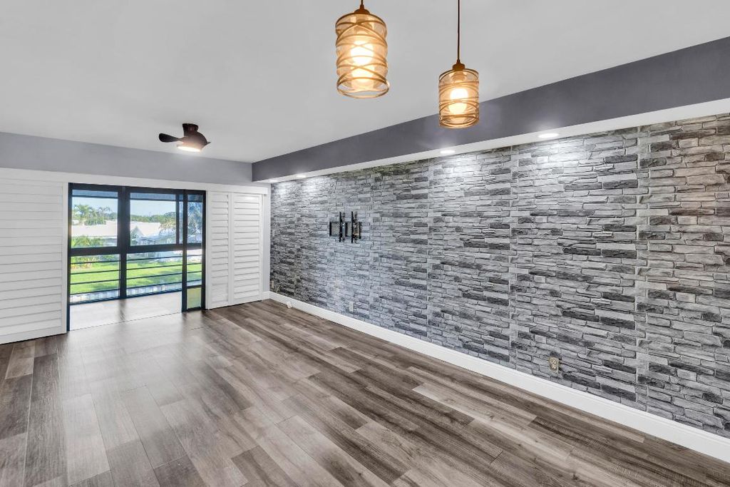 Photo of 1901 W Woolbright Road #A203, Boynton Beach, FL 33426 (MLS # R11151672)