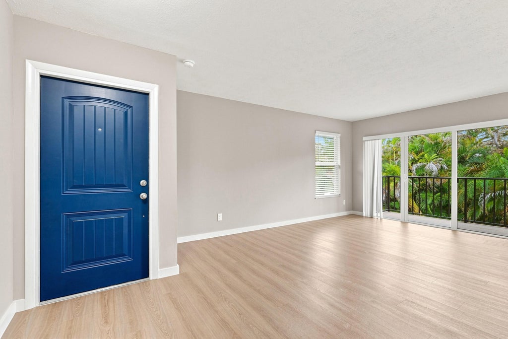Photo of 1180 CARLTON Court #206A, Fort Pierce, FL 34949 (MLS # B26064611)