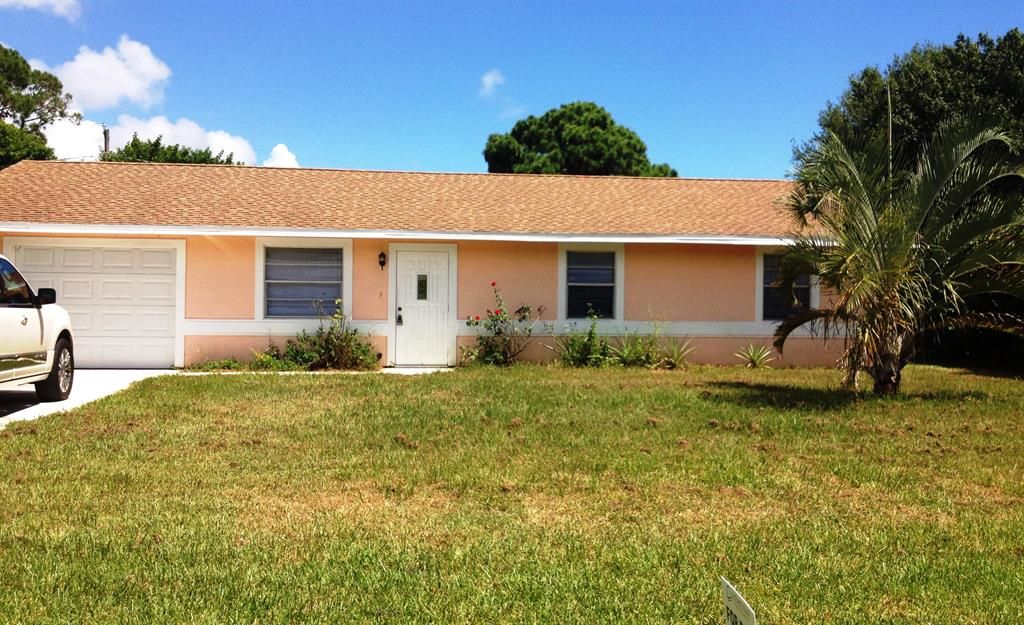 Photo of 6604 Pensacola Road, Fort Pierce, FL 34951 (MLS # R10767552)