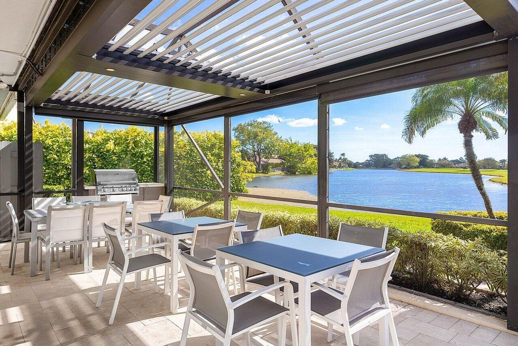 Photo of 64 Dunbar Road, Palm Beach Gardens, FL 33418 (MLS # R10966459)