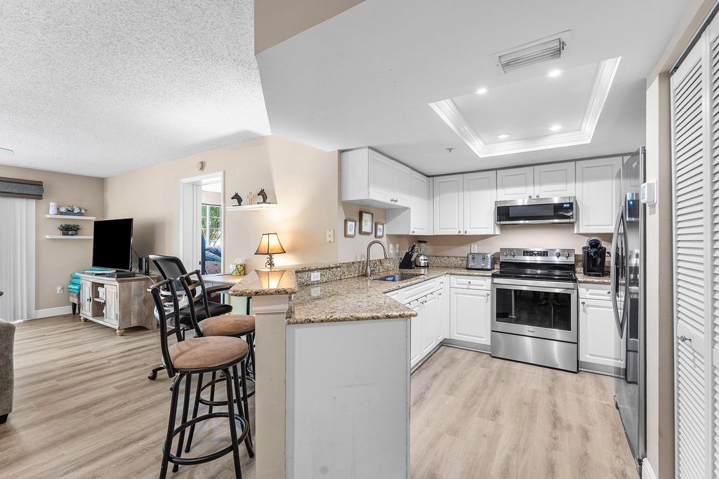 Photo of 1000 Crestwood Court S #1015, Royal Palm Beach, FL 33411 (MLS # R11146311)