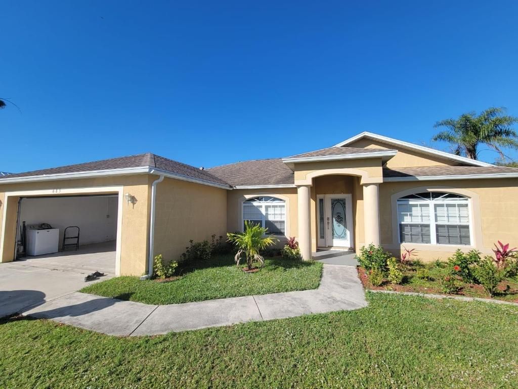 Photo of 685 SW Hoffenberg Ave, Port Saint Lucie, FL 34953 (MLS # R11152598)