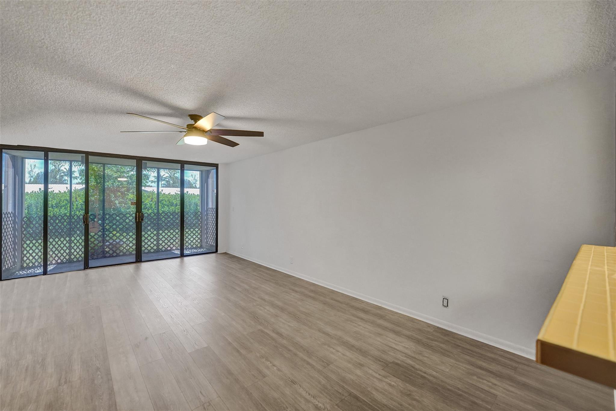Welcome to your newly updated home, perfectly situated just minutes from major highways and schools such as Nova Southeastern University and Broward College. This charming condo features fresh renovations throughout, including brand-new appliances, updated shut-off valves on all water lines, and stylish new ceiling fans for added comfort. Enjoy the convenience of an in-unit washer and dryer and relax in your private screened-in patio or one of two front open areas. The condo boasts a decorative wood accent wall. Vinyl flooring throughout. Community offers a tennis court, pool, lake with a dock to sit on and soak in the sun and a clubhouse that can be rented for events. Great investment property, can rent out right away.