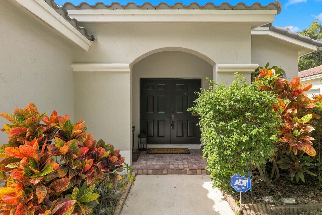 Photo of 4365 NW 45TH Terrace, Coconut Creek, FL 33073 (MLS # B26092356)