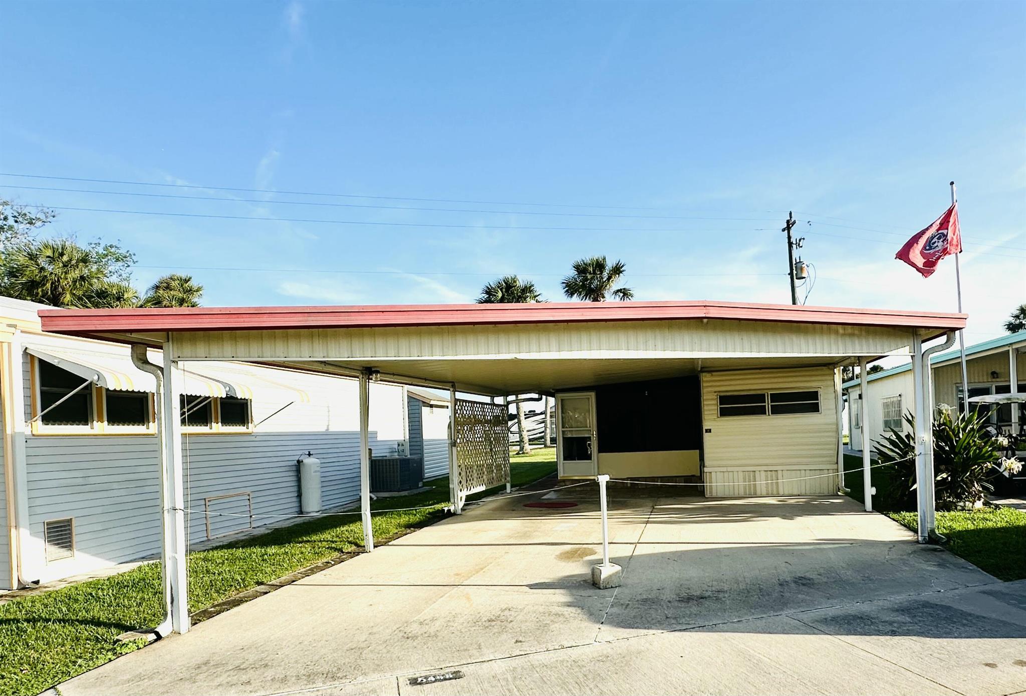ANCIENT OAKS RV RESORT- Welcome to your quiet and enjoyable retirement. This community of 55+ is exactly what you need to enjoy your retirement. Resort has a variety of amenities available for you to enjoy your day to day at your own leisure. HOA is only $186/monthly and it includes water, sewer, cable, lawn maintenance, clubhouse access, pool and much more! This 1 bedroom, I bath RV comes with a dual washer and dryer, small shed, inclosed attached porch and a open carport area for 2 vehicles. It also has a small patio on the back to enjoy your afternoons. Schedule your showing TODAY!! OWNER FINANCING AVAILABLE.