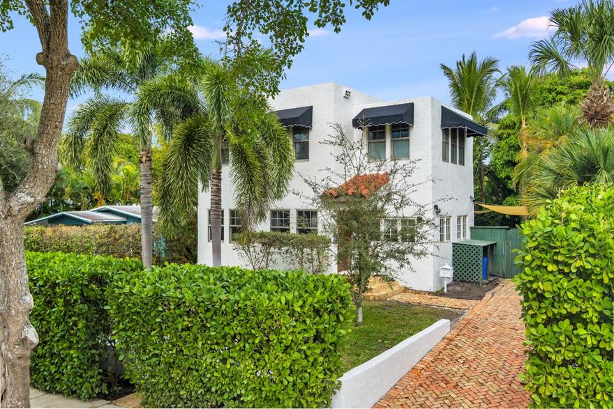 Two-story, recently renovated Spanish style 2BR/2.5BTH home on the coveted ''Hill Block'' of Historic Flamingo Park. All impact windows and refinished hardwood floors throughout. Exterior just painted (White Dove) and awnings replaced (black w/ white trim). Pecky Cypress front door opens to a large, light-filled living room with coved ceilings and fireplace. Double archway to dining room/den with cypress ceiling and three window walls. Beautiful family room with cypress beamed ceiling adjacent to galley kitchen with granite countertops, plenty of cabinet space and gas range. Plus, there is a large laundry room that could convert to a breakfast nook. Upstairs primary bedroom has an ensuite bath with dual vanities, spa tub and separate shower. Large guest bedroom is adjacent to a spa like bath. The expansive backyard features mature landscaping, extensive use of Chicago brick pavers, an oversized patio area and large 15' x 30' heated pool. Just a short walk to City Place and the new Eataly food hall, HIVE shops, Norton Museum of Art, Kravis Center, Howard Park, Armory Arts Center, Antique Row, One Fitness, The Greene School, and zoned to Palm Beach Public, and only two miles from Worth Avenue.