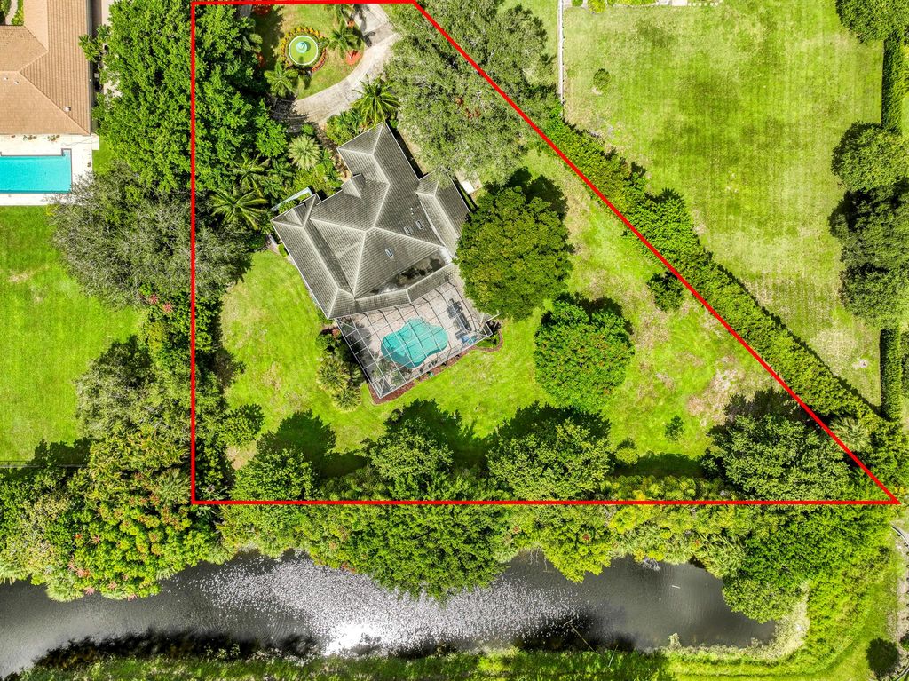 Photo of 5631 Whirlaway Road, Palm Beach Gardens, FL 33418 (MLS # R11118568)