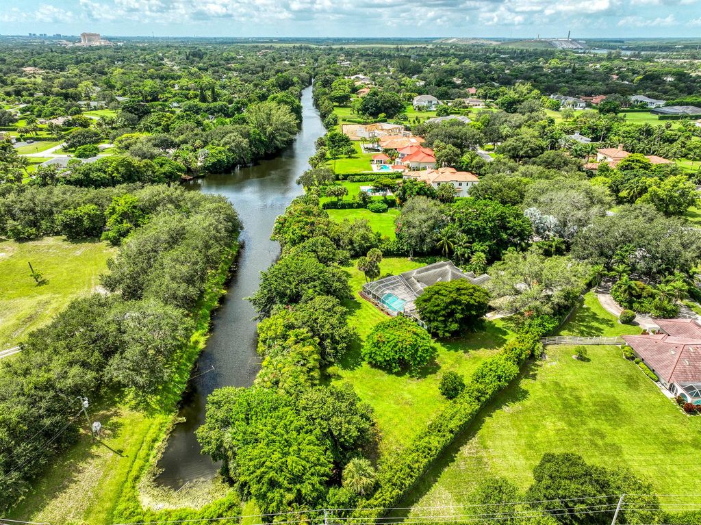 Photo of 5631 Whirlaway Road, Palm Beach Gardens, FL 33418 (MLS # R11118568)