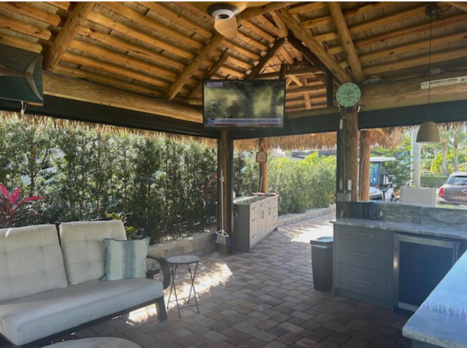 Beautifully landscaped with mature trees for privacy, new synthetic Tiki with electric shades . Enjoy living on the golf course . Kitchen with granite countertops , oven and refrigerator for beverages, with lots of room for entertaining . Motorcoach Resort Class A Resort very active community, Pickle ball, bocce ball, tennis, darts, bike club, Yoga, water aerobics, Social hour on Friday Nights during season , live music and much more more