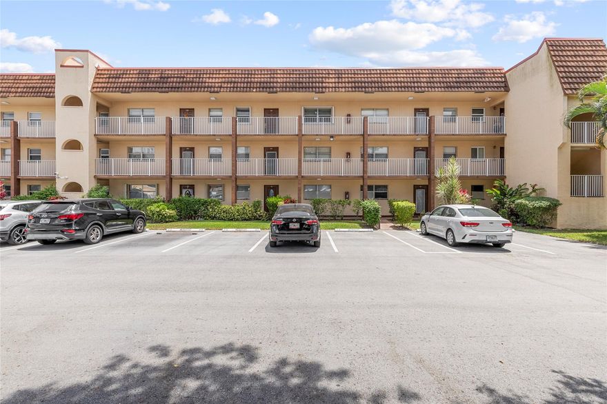 REDUCED FOR FAST SALE. Move-in ready.  2-bedroom, 2-bathroom unit located on the ground floor, corner unit. Looking fresh with its newly painted interior, gleaming bathrooms, stylish wooden cabinets, and durable wooden laminated flooring. Reserved parking spot right in front. The clubhouse, pool, and tennis courts are right in front. Plus, wake up to serene views of the canal right in your backyard!  Brand new Air Conditioner (August 2024).  Wireless internet, 2 TV outlets, and the Pride appliances repair contract are also included in the maintenance. Located in a fabulous, friendly, and social part of Sunrise Lakes.  Easy access to the Main clubhouse, saunas, BBQ, picnic areas, billiards, theater, and courtesy buses to stores.