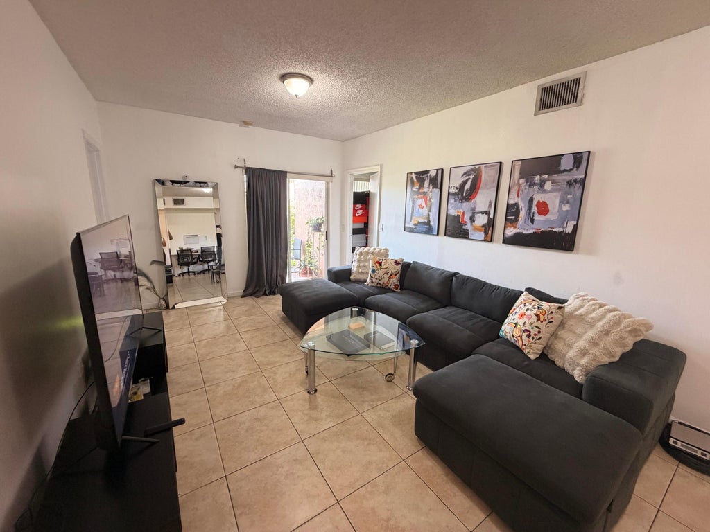 Photo of 3271 Sabal Palm Manor #106, Hollywood, FL 33024 (MLS # B26059294)