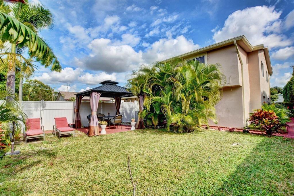 Completely Renovated NEW with full impact glass too! Very Unique single family home has split the levels for each separate unit.... This unit is on the FIRST floor with private entrance to your 3bed/2bath and a fabulous fenced in entertainment yard. Total sq footage for this unit is 2160 under air, PLUS a HUGE fenced in yard with a Pergola perfect for grilling and entertaining and perfect for dogs. Plenty of parking to accommodate 4 cars, enter into the left side fence to your screened in patio, kitchen looks over the back yard and comes complete with your own washer and dryer, fully tiled flooring and stainless steel appliances. There is RV and BOAT space for additional fee. This is a duplex style home BUT completely PRIVATE!!! Total =$2,500 which includes water electric and lawn.