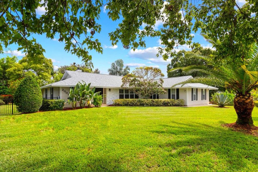 Photo of 2001 SE Hanford Road, Port Saint Lucie, FL 34952 (MLS # R11056296)