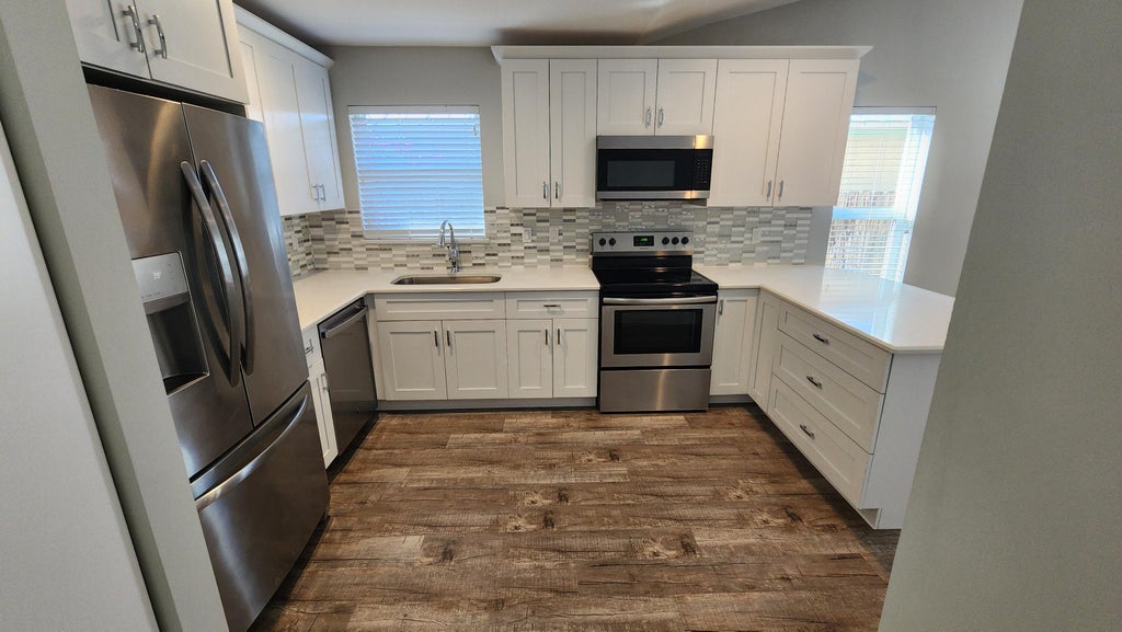 Photo of 8783 SE HOBE RIDGE Avenue, Hobe Sound, FL 33455 (MLS # B26056177)